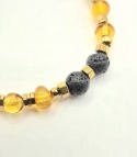 Bransoletka 'złoto Bałtyku' z bursztynu, lawy i złotego hematytu