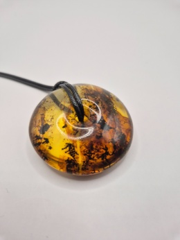 Naszyjnik duże bursztynowe koło na rzemieniu