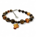 Bransoletka z tygrysiego oka z bursztynowym krzyżem